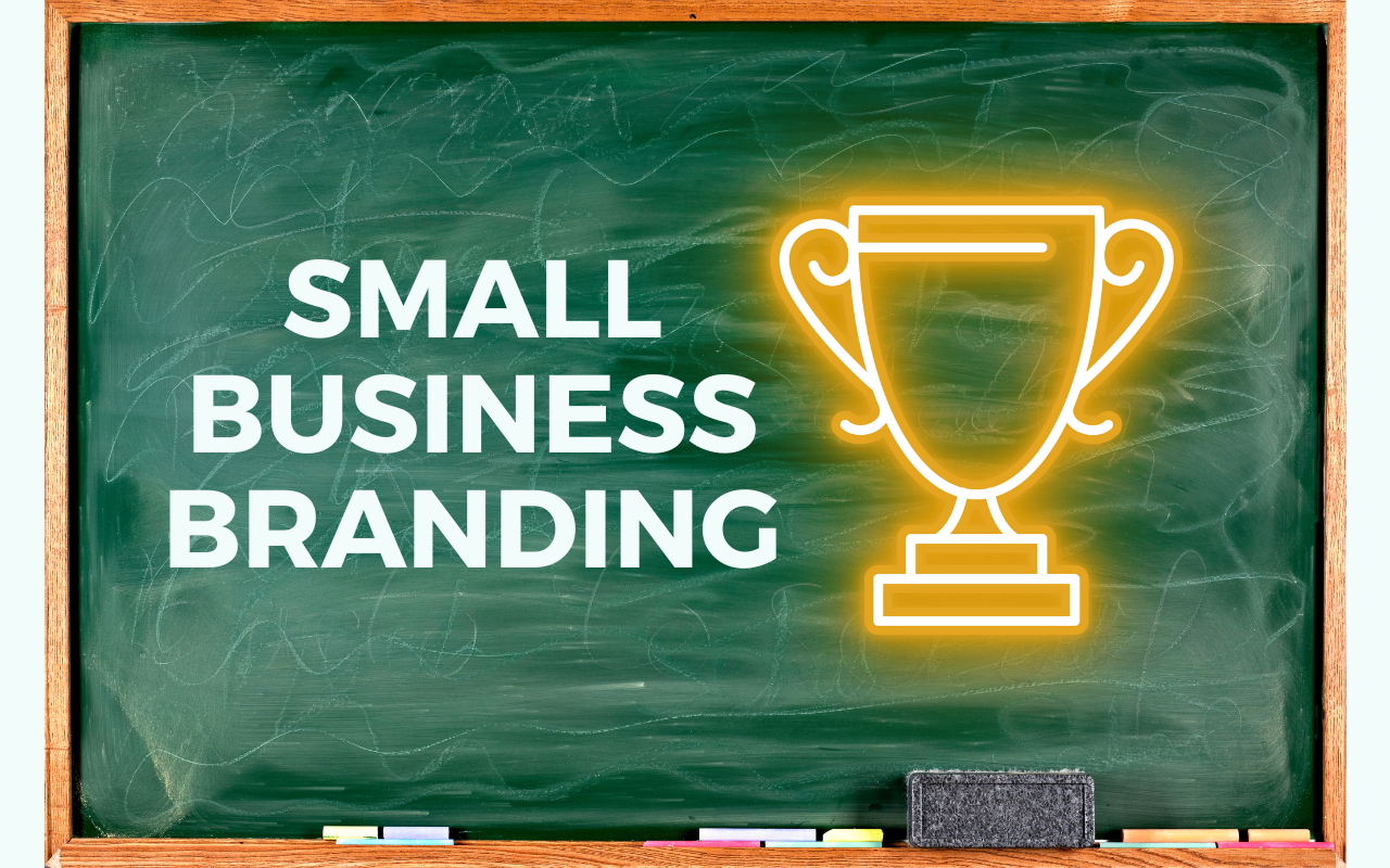 chalkboard with the words "small business branding" and a glowing trophy next to the words to symbolize winning